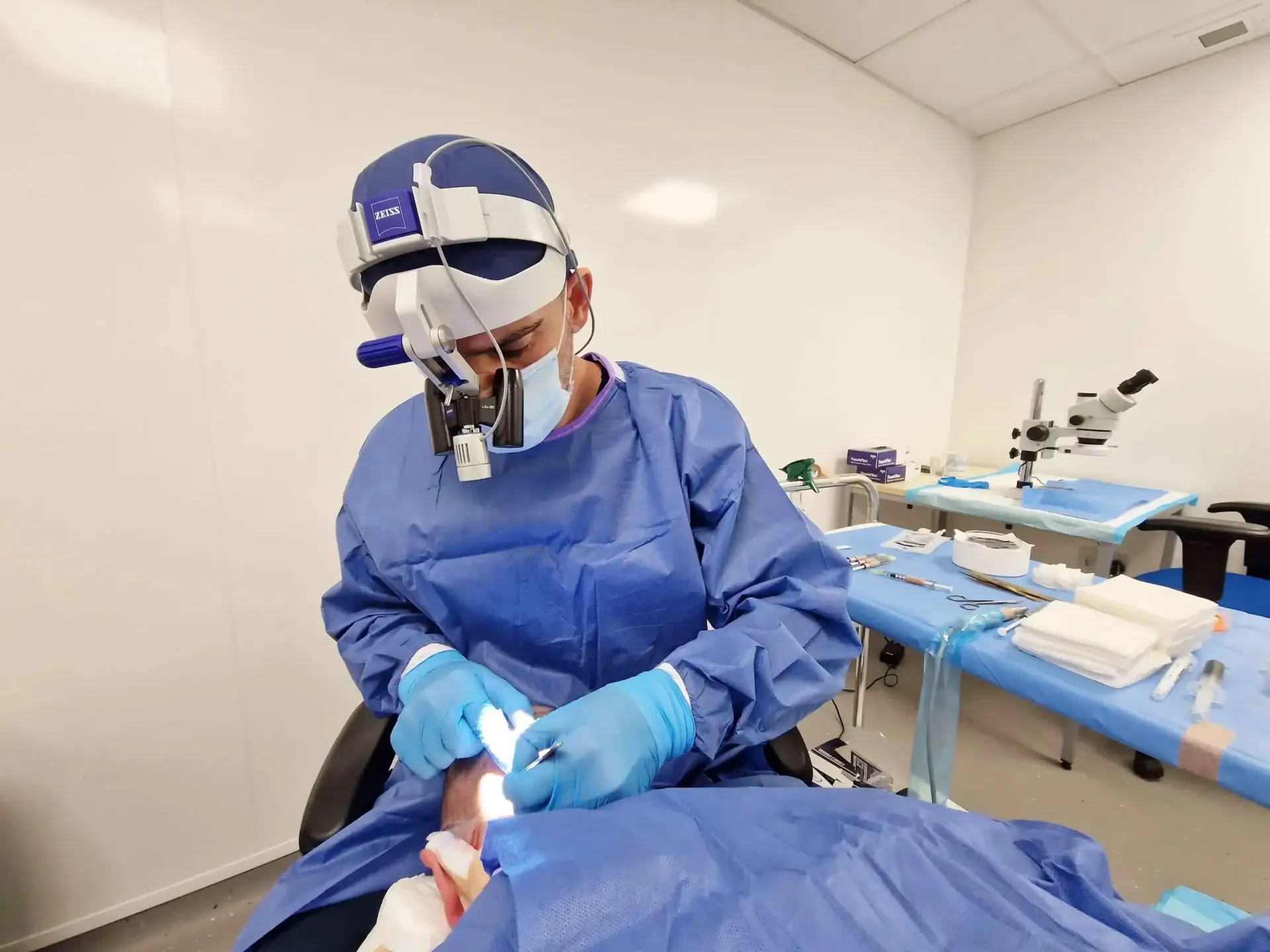 Dr Bonaros extracting follicular units during an FUE procedure